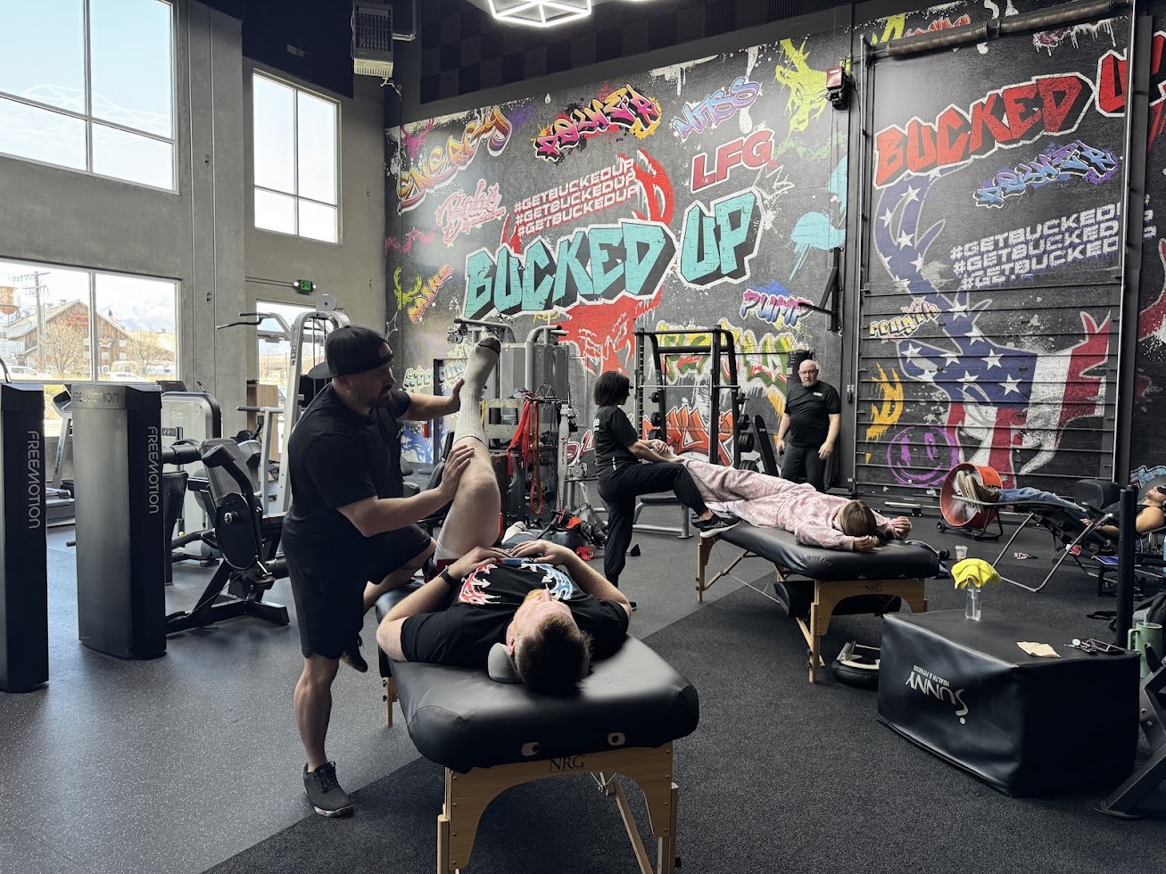 Shawn Taylor working hands on with a client